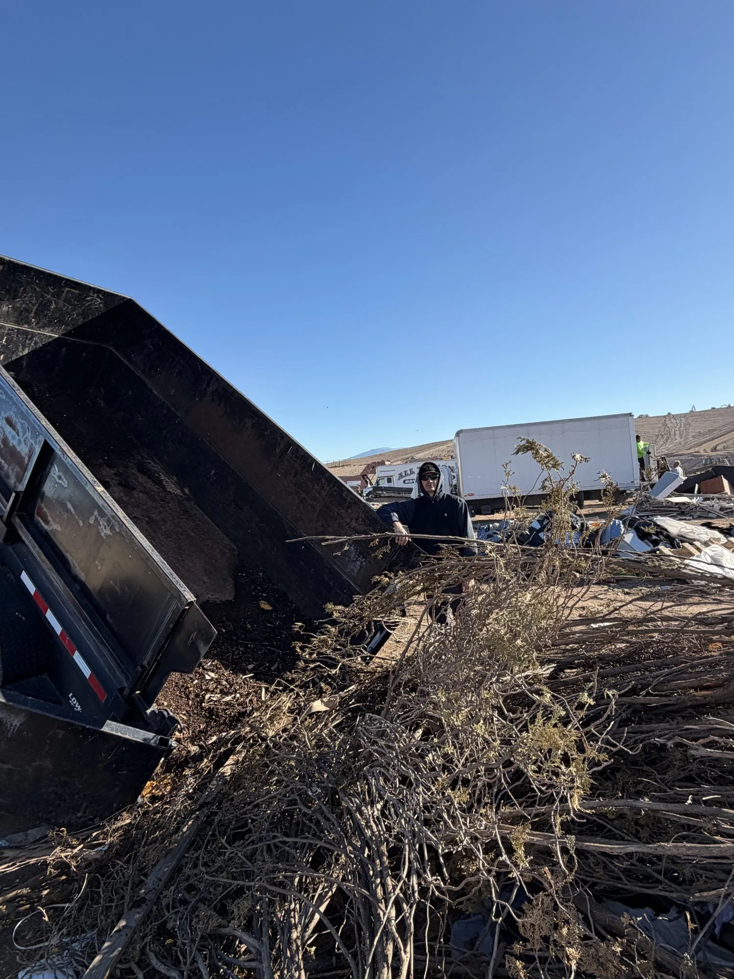 Haul Heroes crew hauling furniture and debris in Tucson AZ